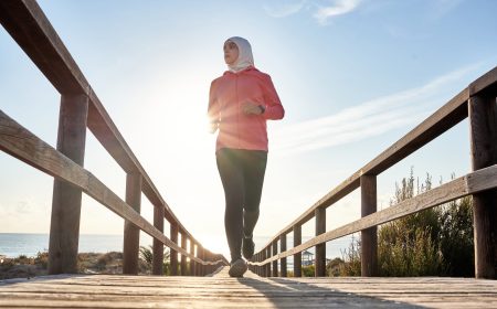 Young,Muslim,Runner,Training,On,The,Beach